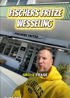 Thumbnail vom Reel von @simoninreel. Schriftzug "Fischers Fritze Wesseling" mit Simon im Vordergrund, wie er vor dem Ladenlokal steht.